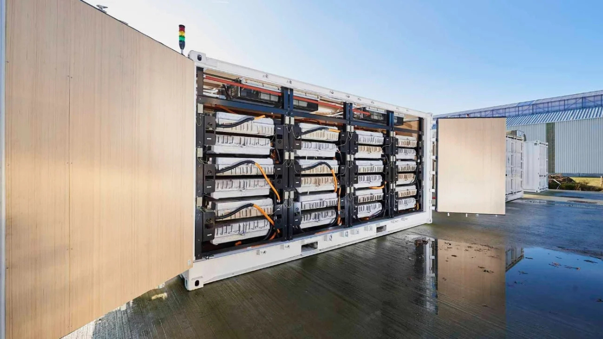 Second-life EV batteries installed in a large energy storage unit.