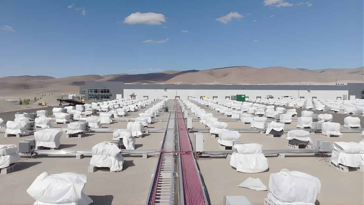 Covered EV battery modules stored outdoors at a US facility, highlighting second-life reuse and recycling efforts.