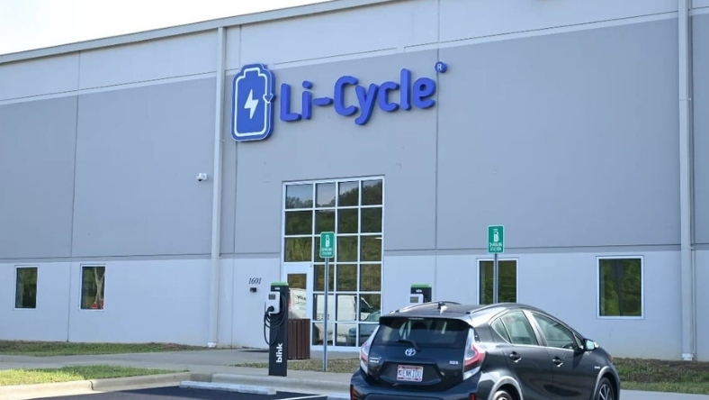 Li-Cycle battery recycling facility exterior with electric vehicle charging stations