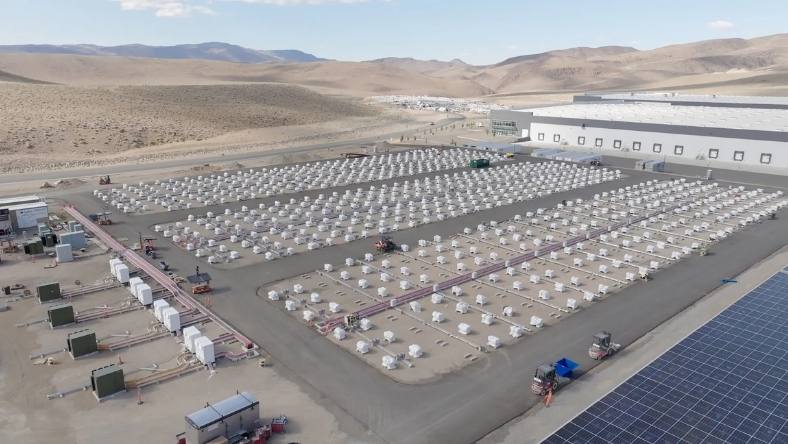 Aerial view of a large battery processing and storage facility in a desert location