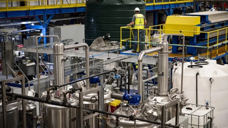 Battery recycling facility with stainless steel processing tanks