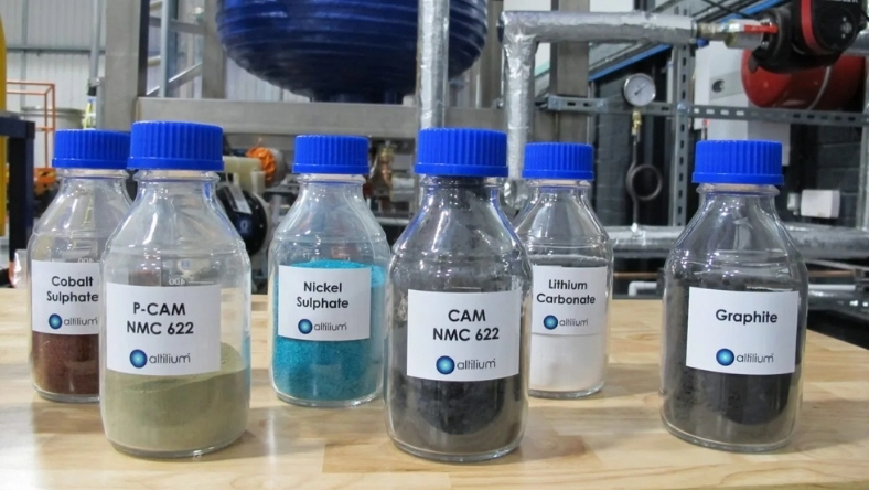 Recycled EV cathode materials displayed in laboratory jars
